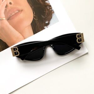 Sunglasses with golden BB inserts